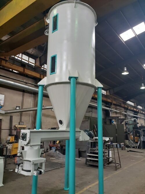 Powder material tank with pneumatic bag holder